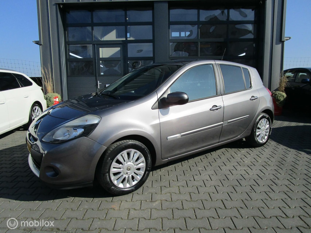 Renault Clio - 1.2 TCe Collection 5drs Airco Cruise Trekhaak - AutoWereld.nl