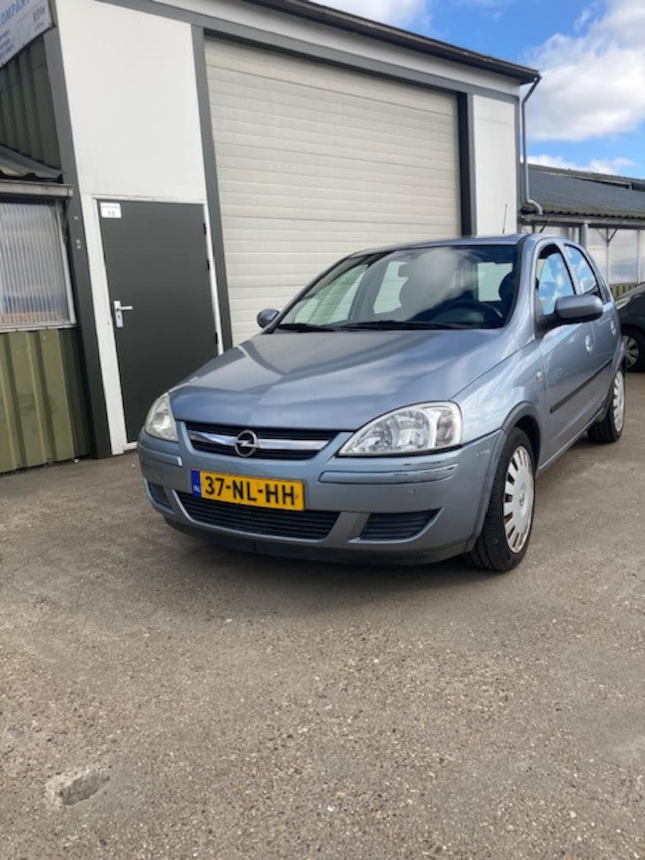 Opel Corsa - 1.2-16V Enjoy 1.2-16V Enjoy - AutoWereld.nl