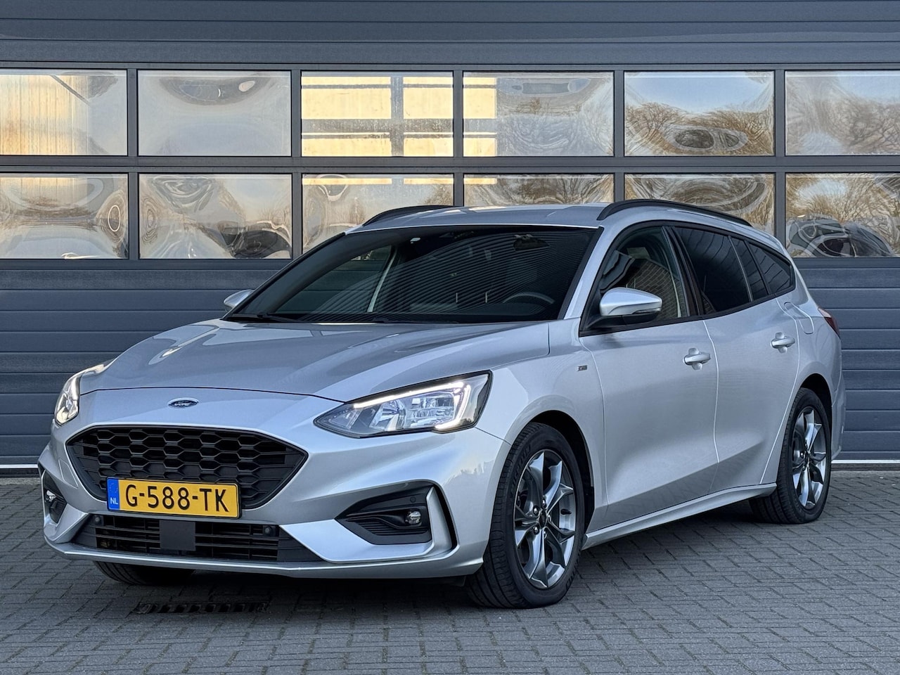 Ford Focus Wagon - FORD 1.0 ECOBOOST ST LINE BUSINESS I APPLE/ANDROID I 53.138KM! I CRUISE CONTROL I NAVIGATI - AutoWereld.nl