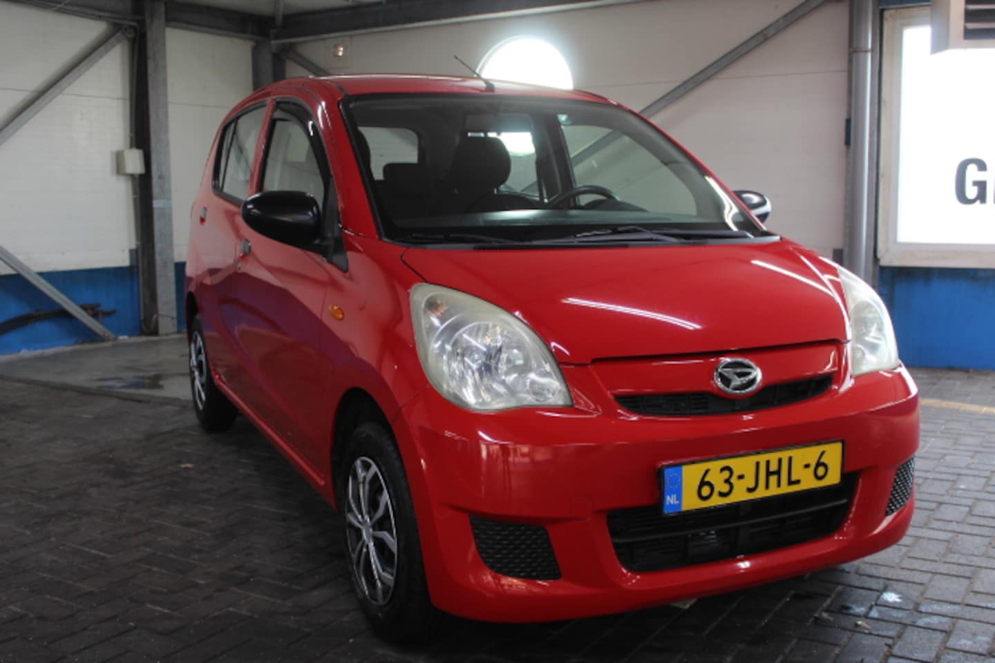 Daihatsu Cuore - 1.0 Comfort Lage kmstand!, Airco, Stuurbekrachtiging, All Season banden! - AutoWereld.nl