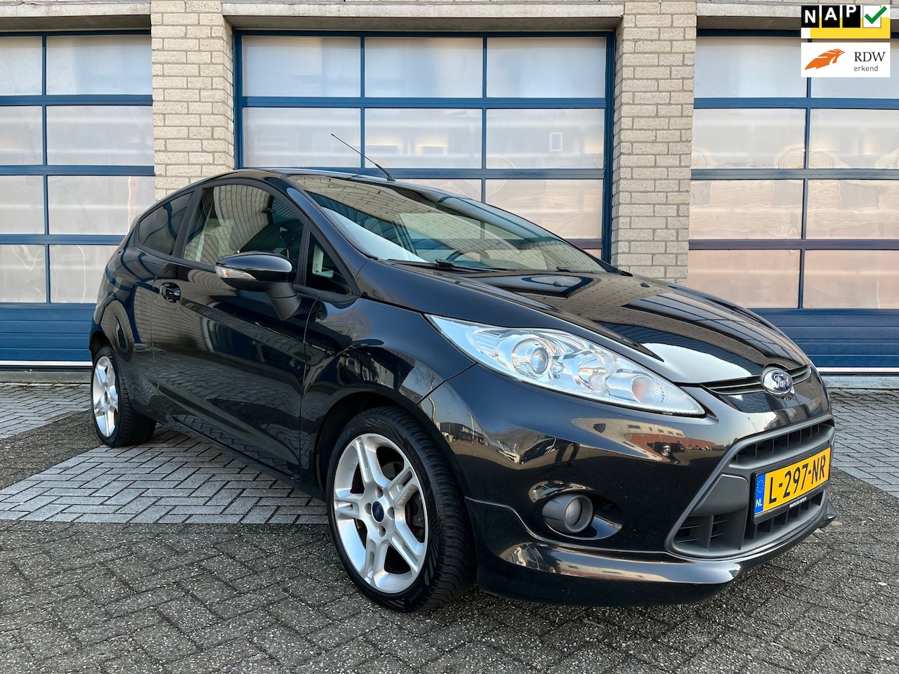 Ford Fiesta - 1.4 Clima - Sportstoelen - Stoelverwarming - Goed onderhouden - Lm velgen - AutoWereld.nl