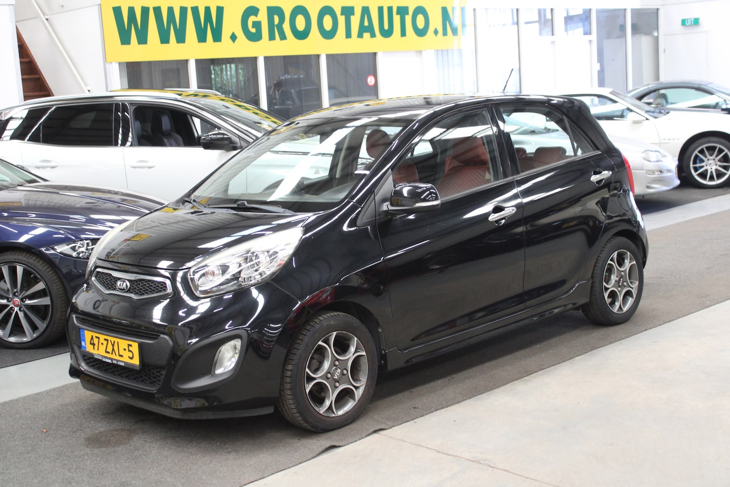 Kia Picanto - 1.0 CVVT Design Edition 72.185km NAP, Airco, Isofix - AutoWereld.nl