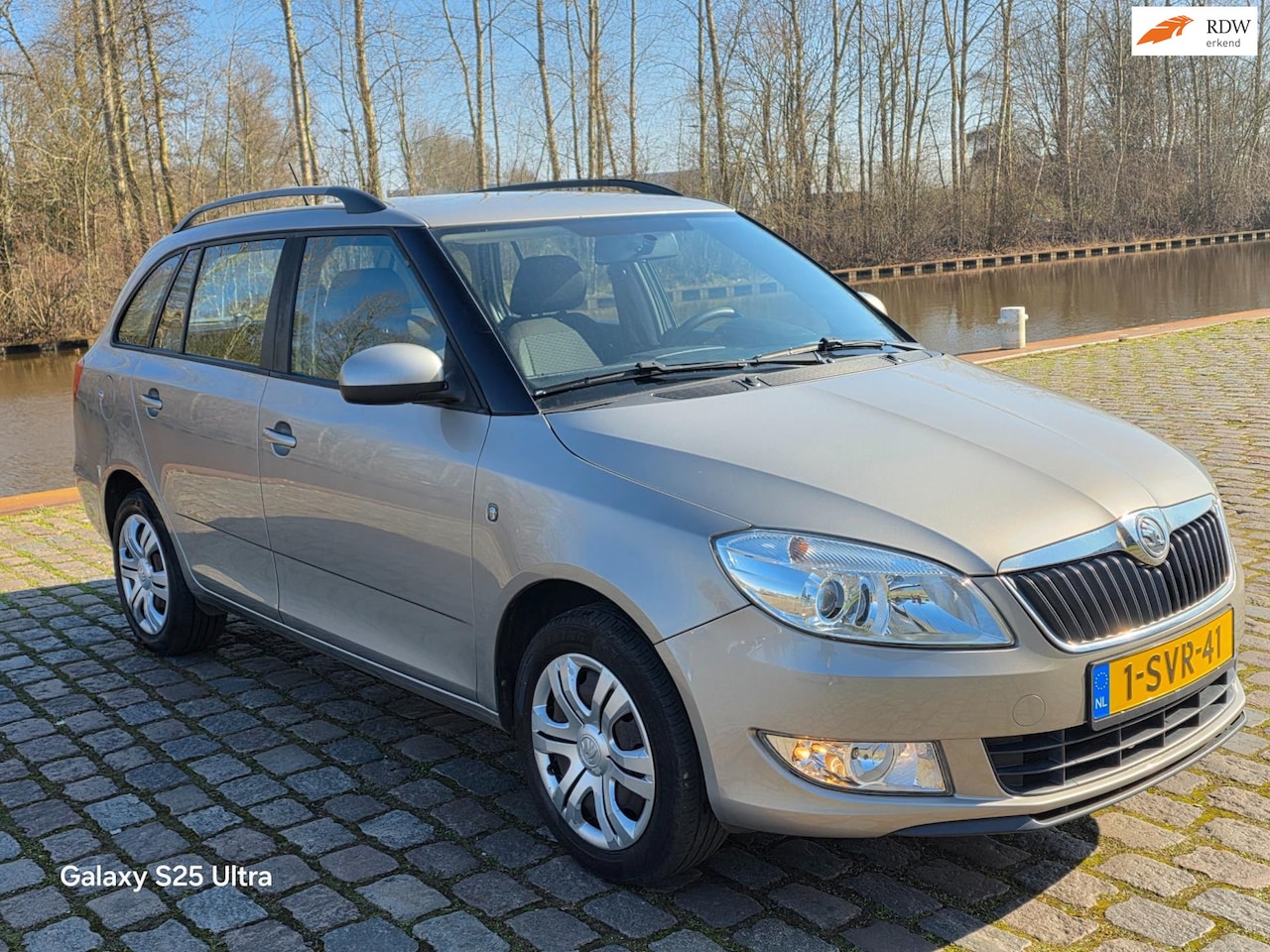 Skoda Fabia Combi - 1.2 TSI Scout airco elektrische ramen cv op afs - AutoWereld.nl