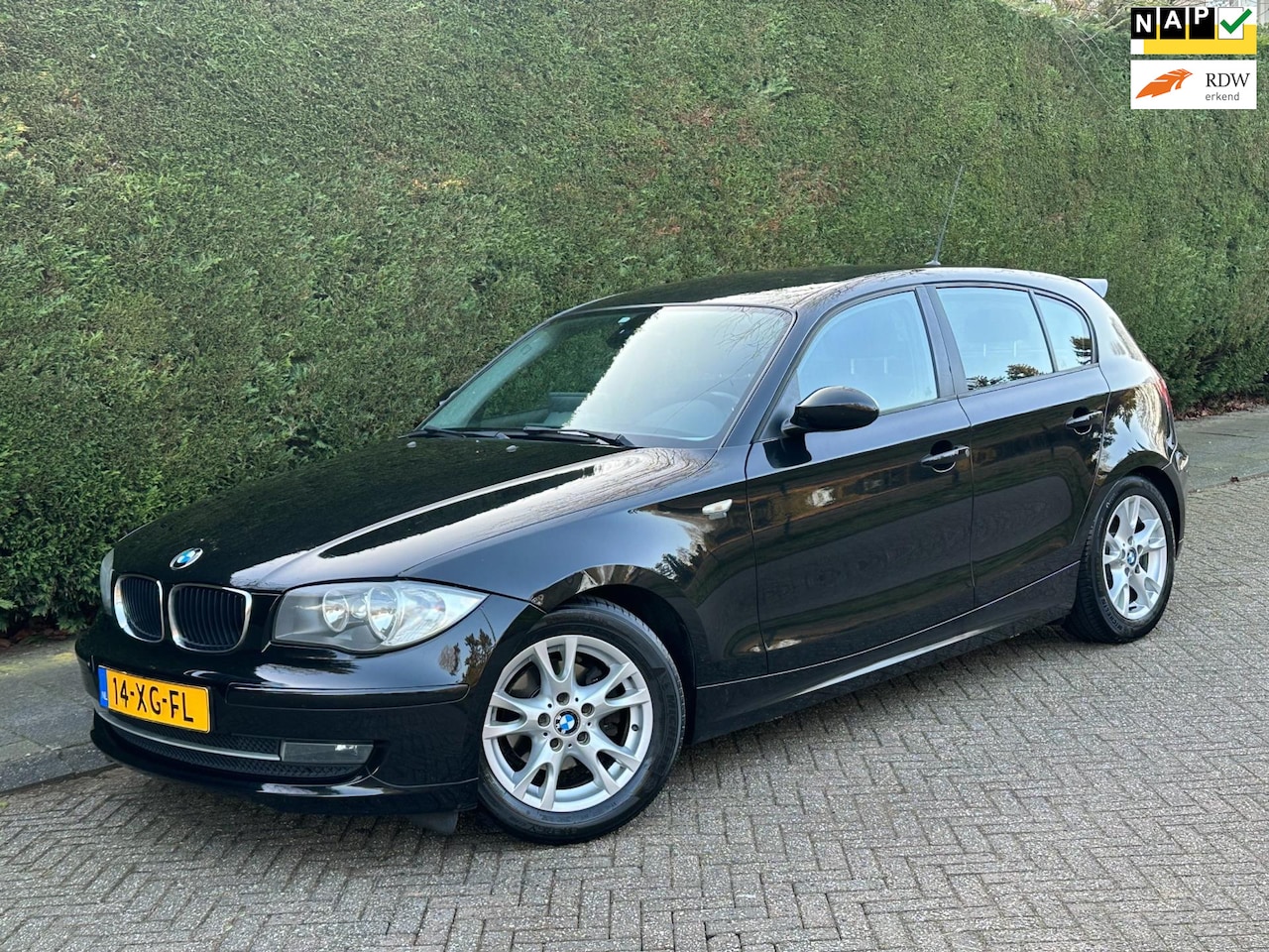 BMW 1-serie - 116i High Executive /6BAK/NAVI/RIJDTGOED!/ - AutoWereld.nl