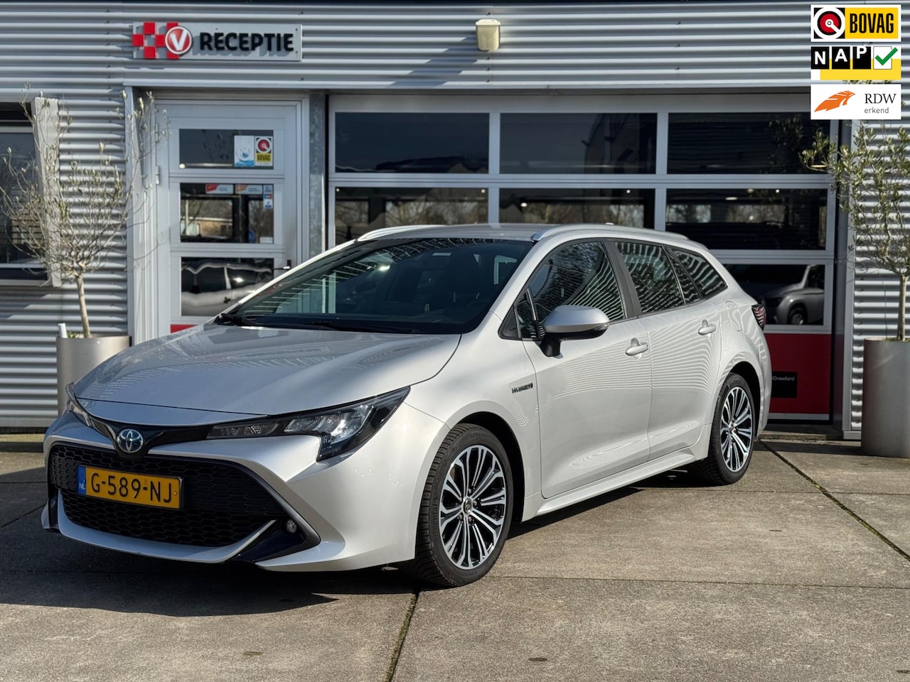 Toyota Corolla Touring Sports - 1.8 Hybrid Dynamic / Navi / Cruise / Clima / 1-Eig - AutoWereld.nl