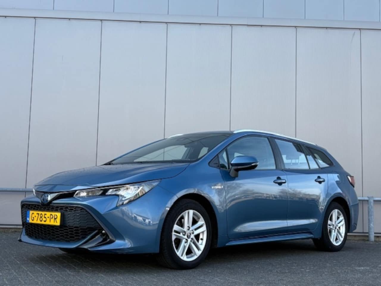 Toyota Corolla Touring Sports - 1.8 Hybrid - automaat - camera - nap! - airco - cruise - - AutoWereld.nl