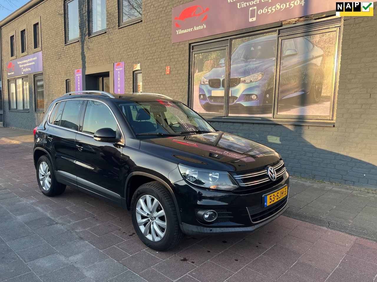 Volkswagen Tiguan - 1.4 TSI Sport&Style nieuwe type navi - AutoWereld.nl