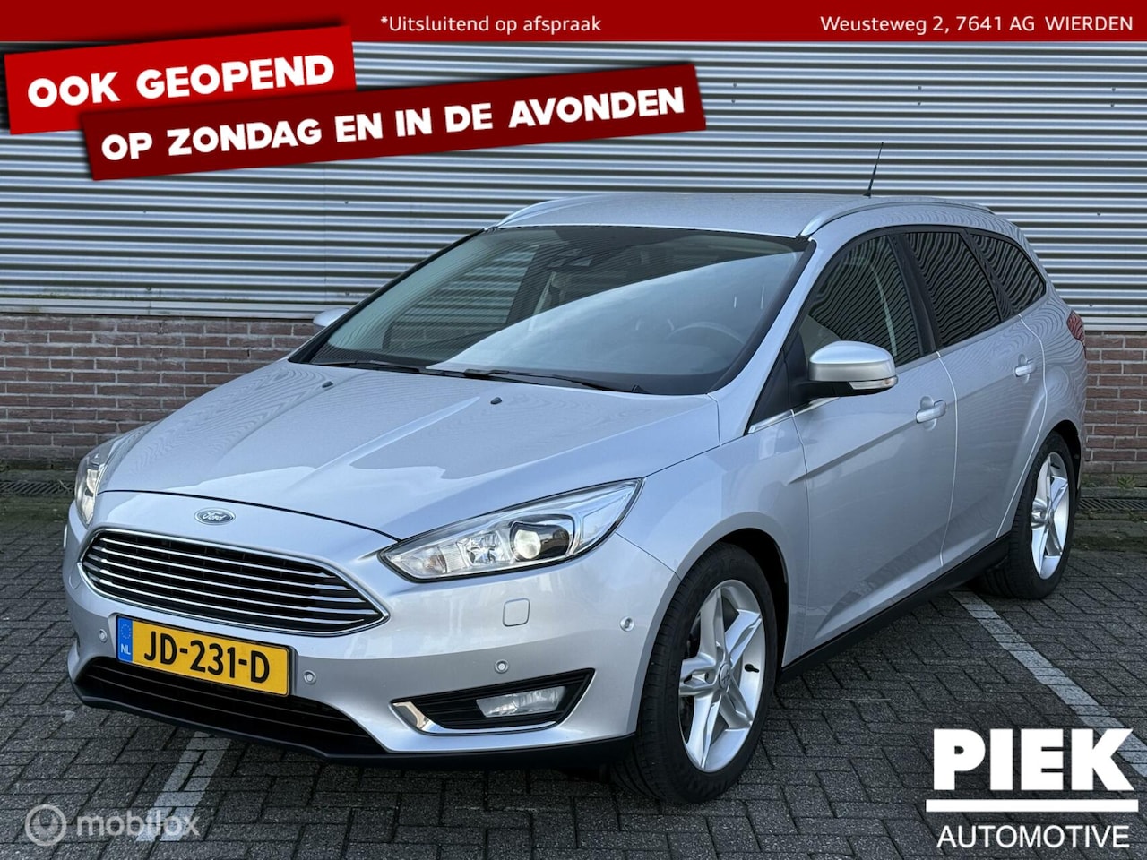 Ford Focus Wagon - 1.0 Titanium Edition BOMVOL - AutoWereld.nl