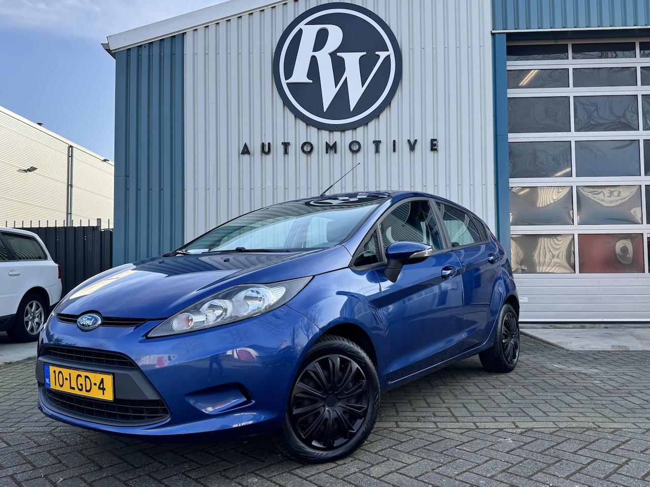 Ford Fiesta - 1.25 Limited 5-DEURS / Airco / Centr vergr / NL Auto / N.A.P. - AutoWereld.nl