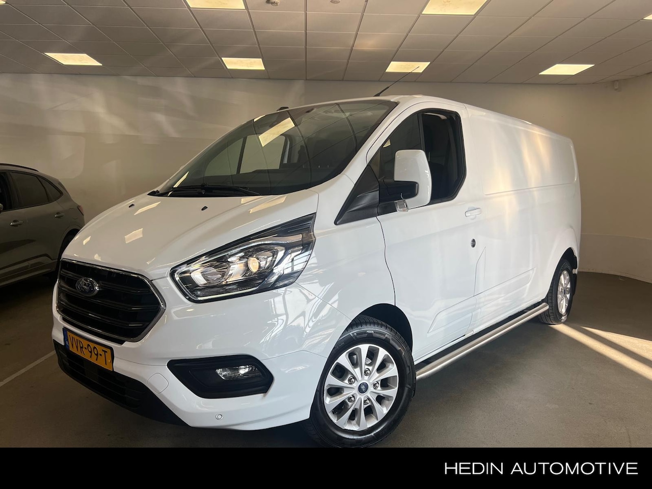 Ford Transit Custom - 300 L2H1 Limited | Navi | Airco | Sidebars | Stoelverwarming | Trekhaak - AutoWereld.nl