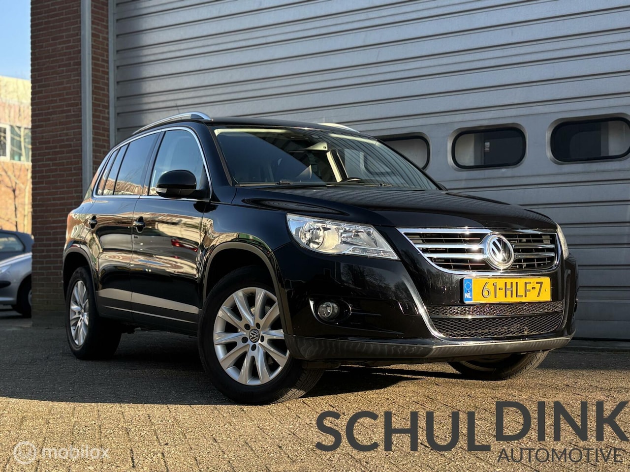 Volkswagen Tiguan - 1.4 TSI Sport&Style 4Motion STOELVERWARMING - AutoWereld.nl