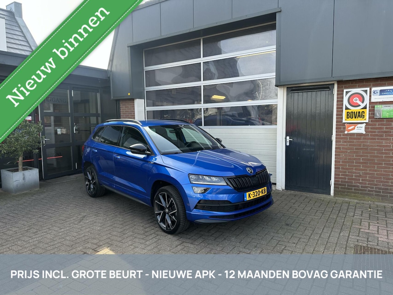 Skoda Karoq - 1.5 TSI ACT Sportline Business CARPLAY/TH *ALL-IN PRIJS* - AutoWereld.nl