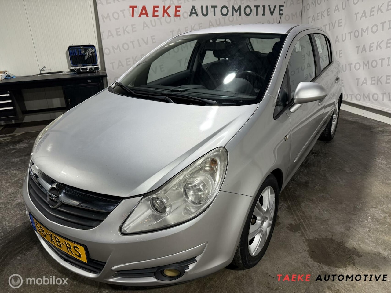 Opel Corsa - 1.4-16V Cosmo Airco/Cruise/2e EIG - AutoWereld.nl