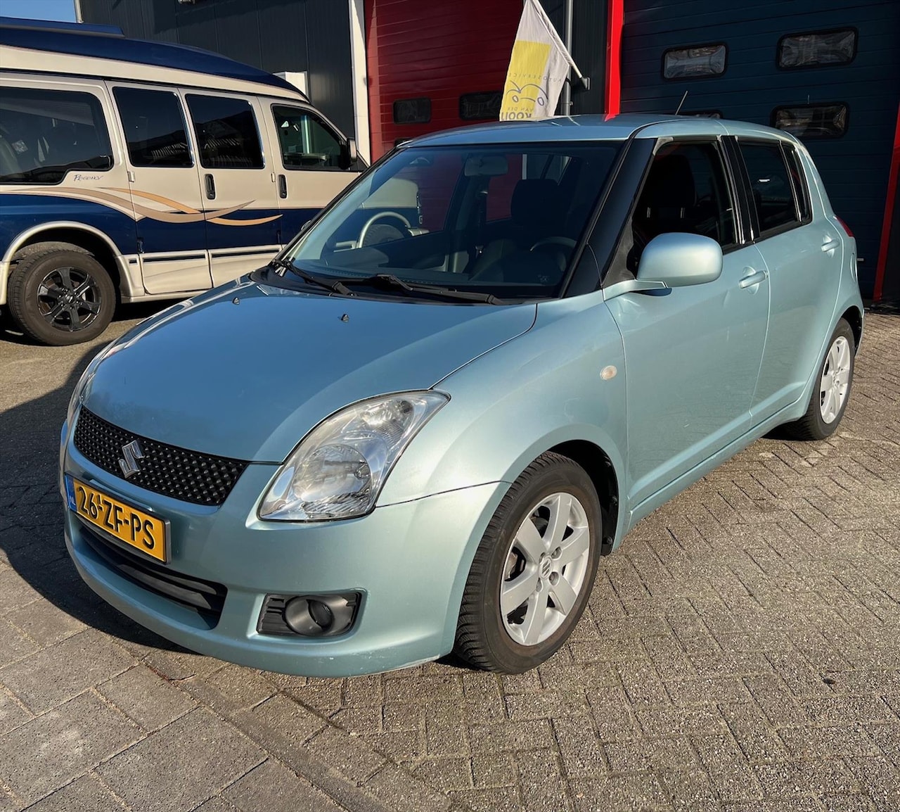 Suzuki Swift - 1.3 5DRS - AutoWereld.nl