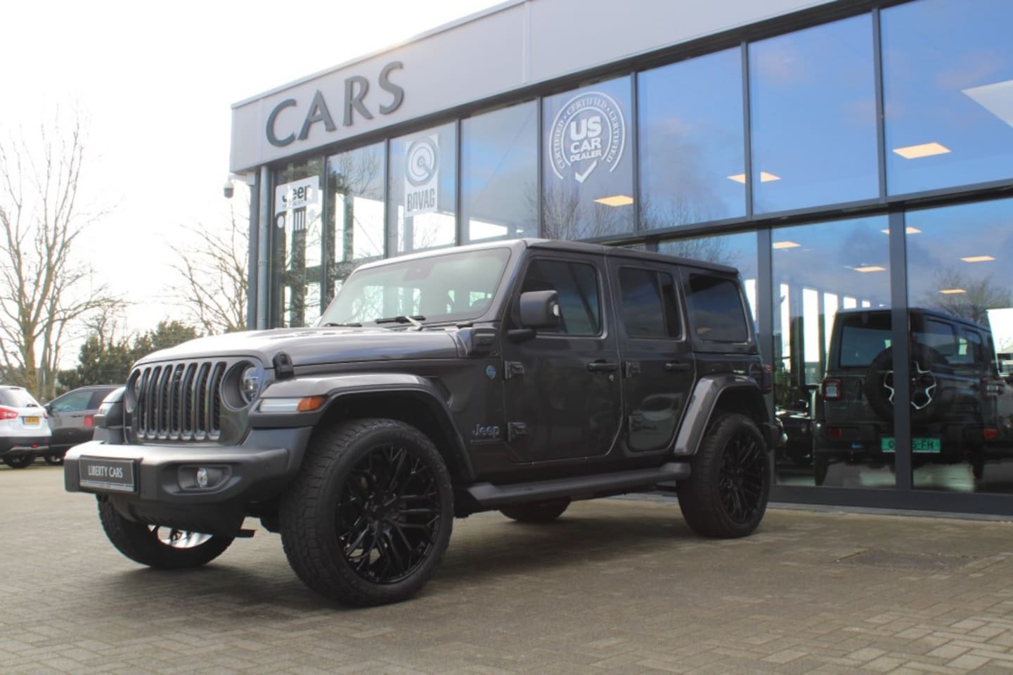 Jeep Wrangler - 4XE PLUG-IN HYBRID 80TH ANNIVERSARY / SAHARA Edition - AutoWereld.nl