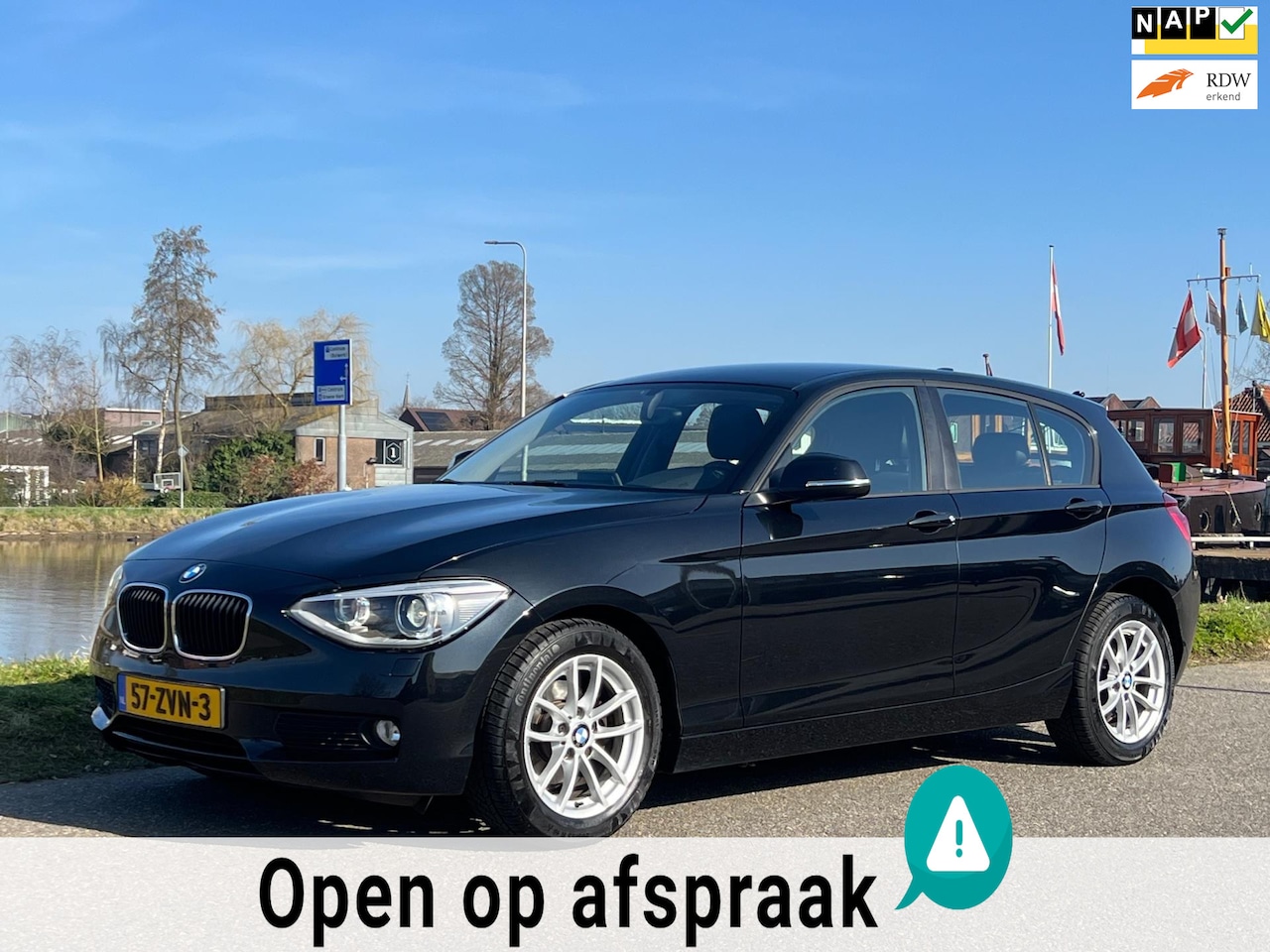 BMW 1-serie - 116i Upgrade Edition LEDER XENON NAVI AIRCO - AutoWereld.nl