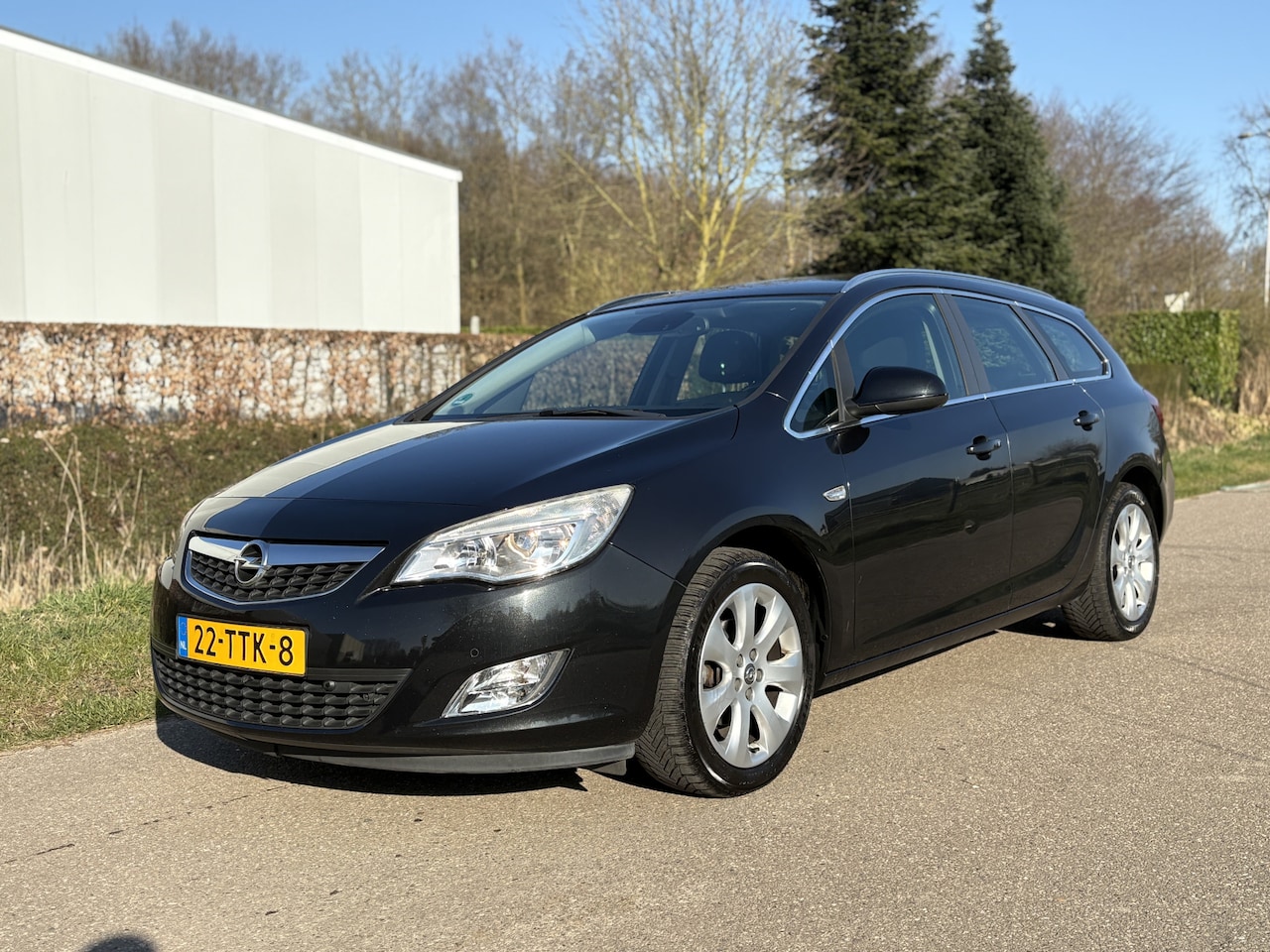 Opel Astra Sports Tourer - 1.4 Cosmo / NAVI / LEER / CRUISE / STOELVERWARMING / 168dkM! NAP! - AutoWereld.nl