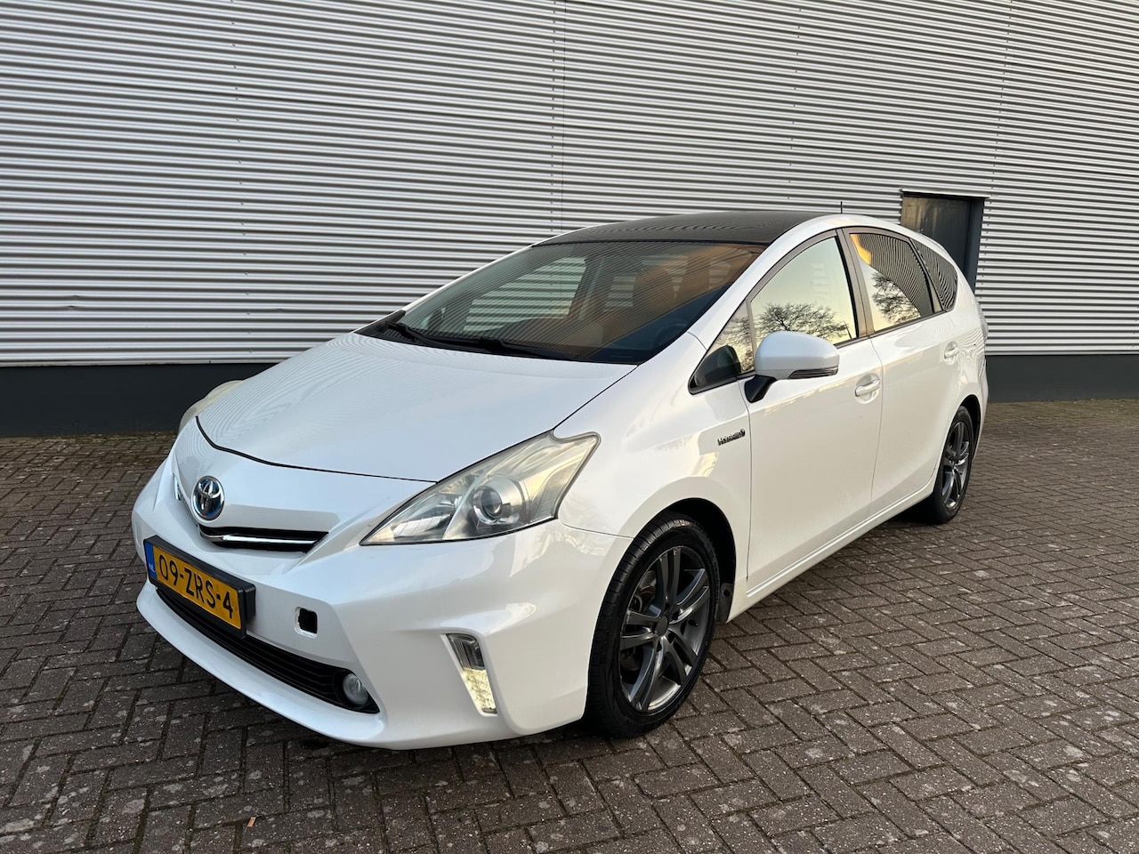 Toyota Prius Wagon - 1.8 Aspiration Navi Head-Up 7-Persoons Panoramadak - AutoWereld.nl