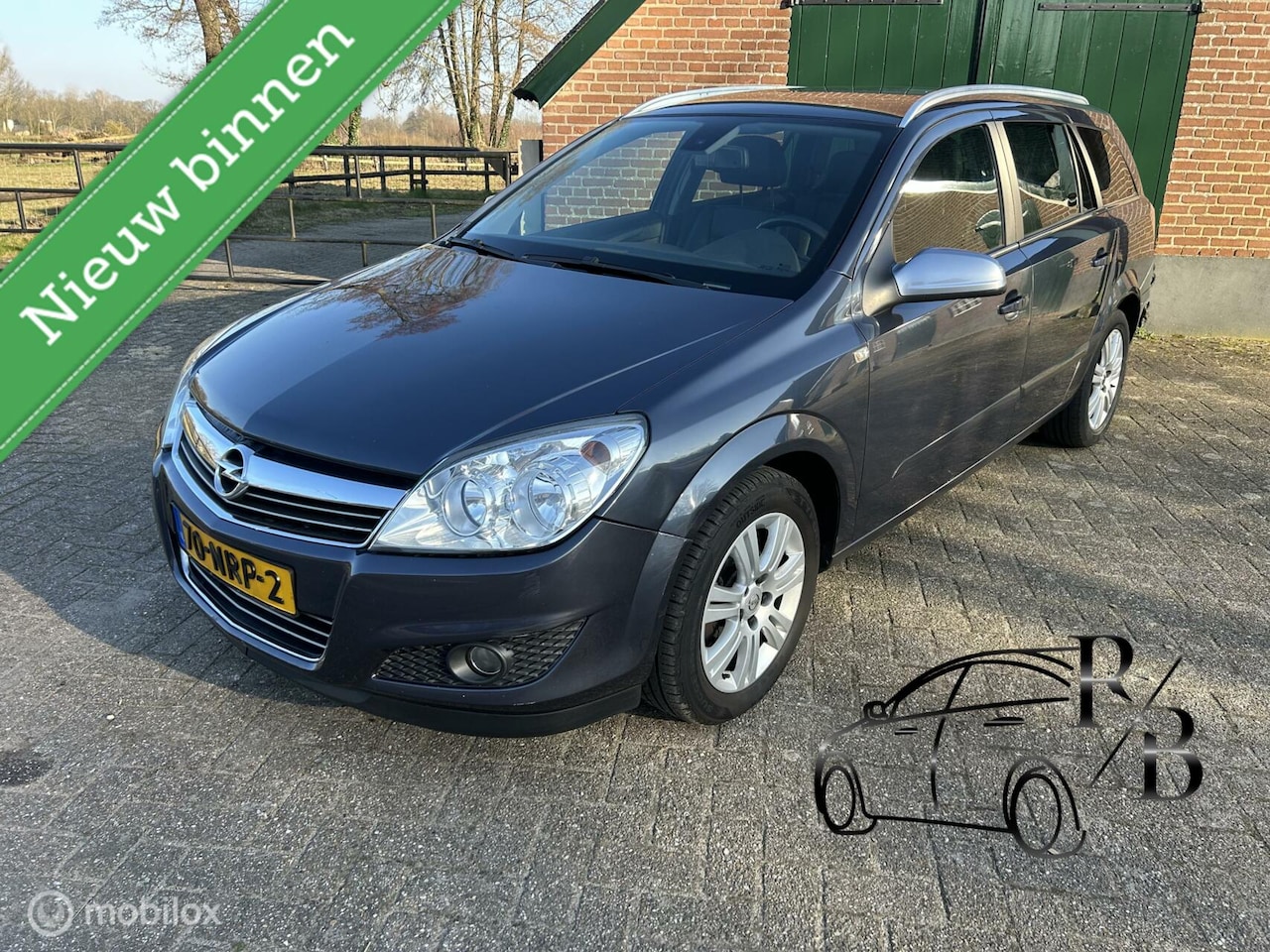 Opel Astra Wagon - 1.6 Cosmo INRUIL KOOPJE LEER/NAVI/AIRCO/TREKHAAK - AutoWereld.nl