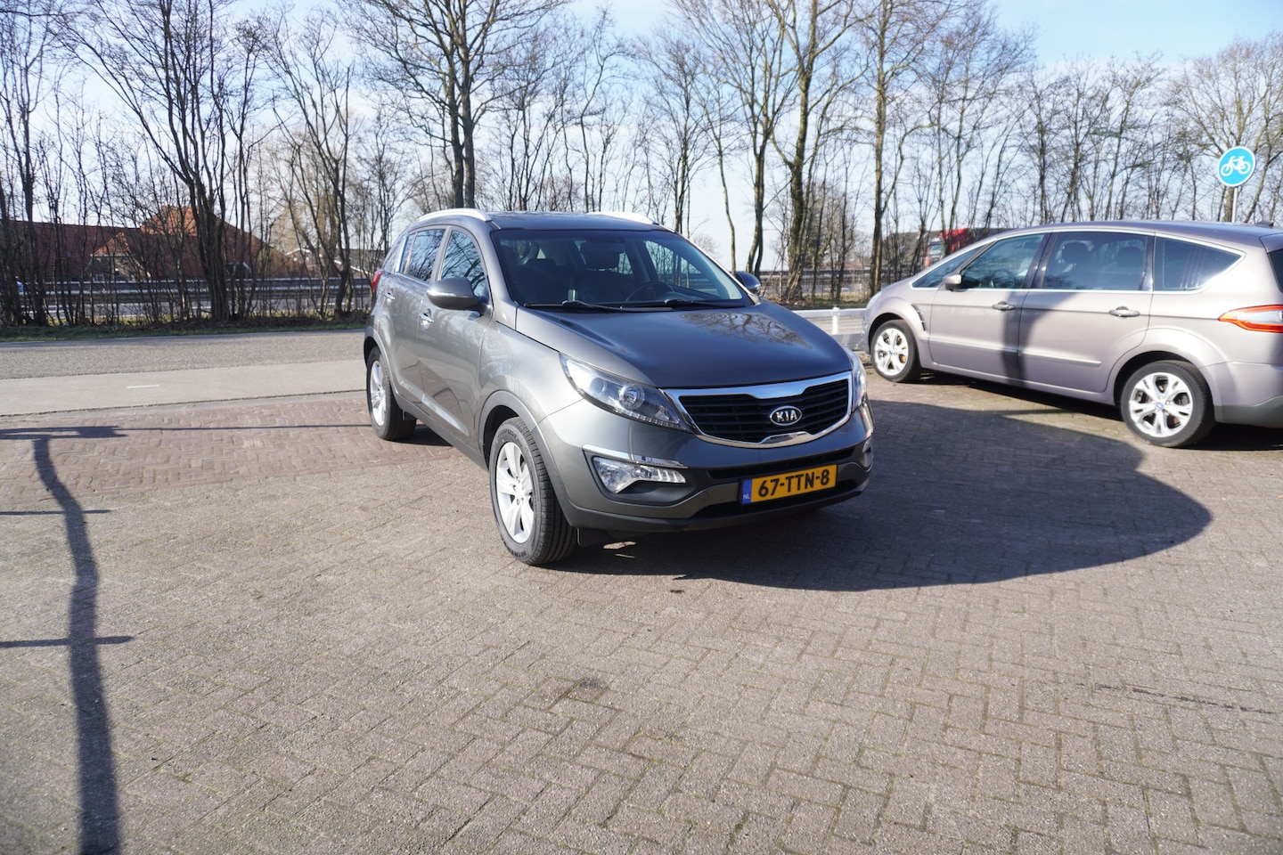 Kia Sportage - 2.0 X-ecutive Plus Pack CRUISE NAVI CLIMA - AutoWereld.nl