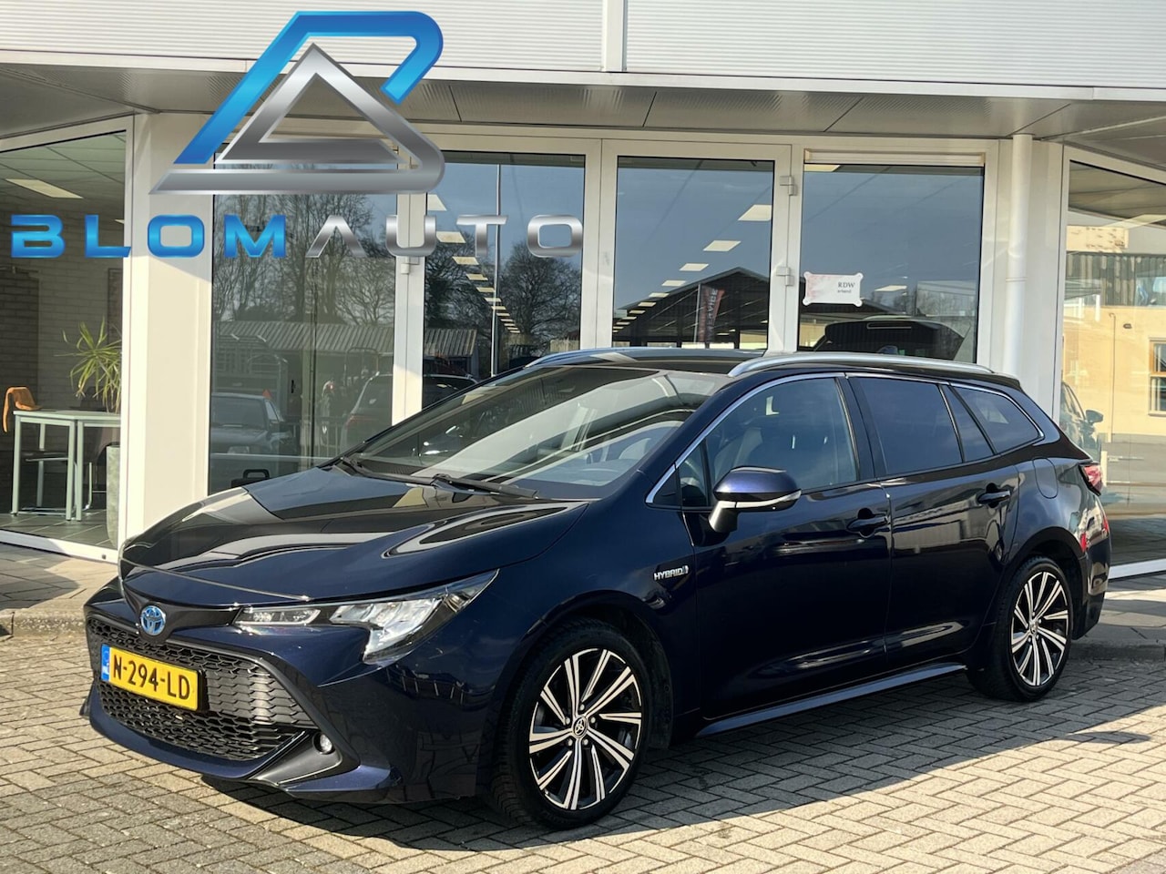 Toyota Corolla Touring Sports - 1.8 Hybrid CARPLAY+KEYLESS - AutoWereld.nl