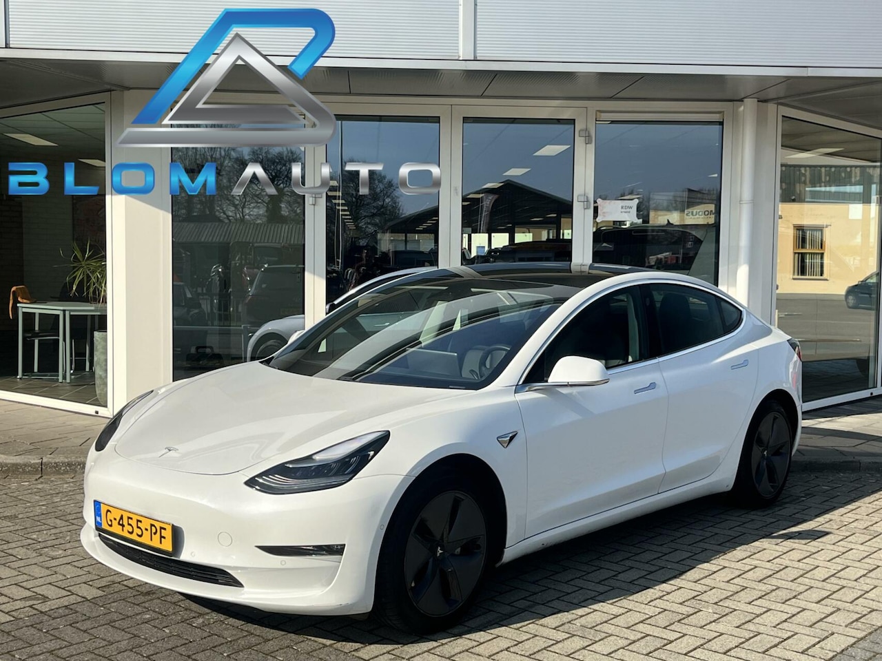 Tesla Model 3 - Long Range RWD Long Range AWD 75 kWh 352PK AUTOPILOT+TREKHAAK - AutoWereld.nl