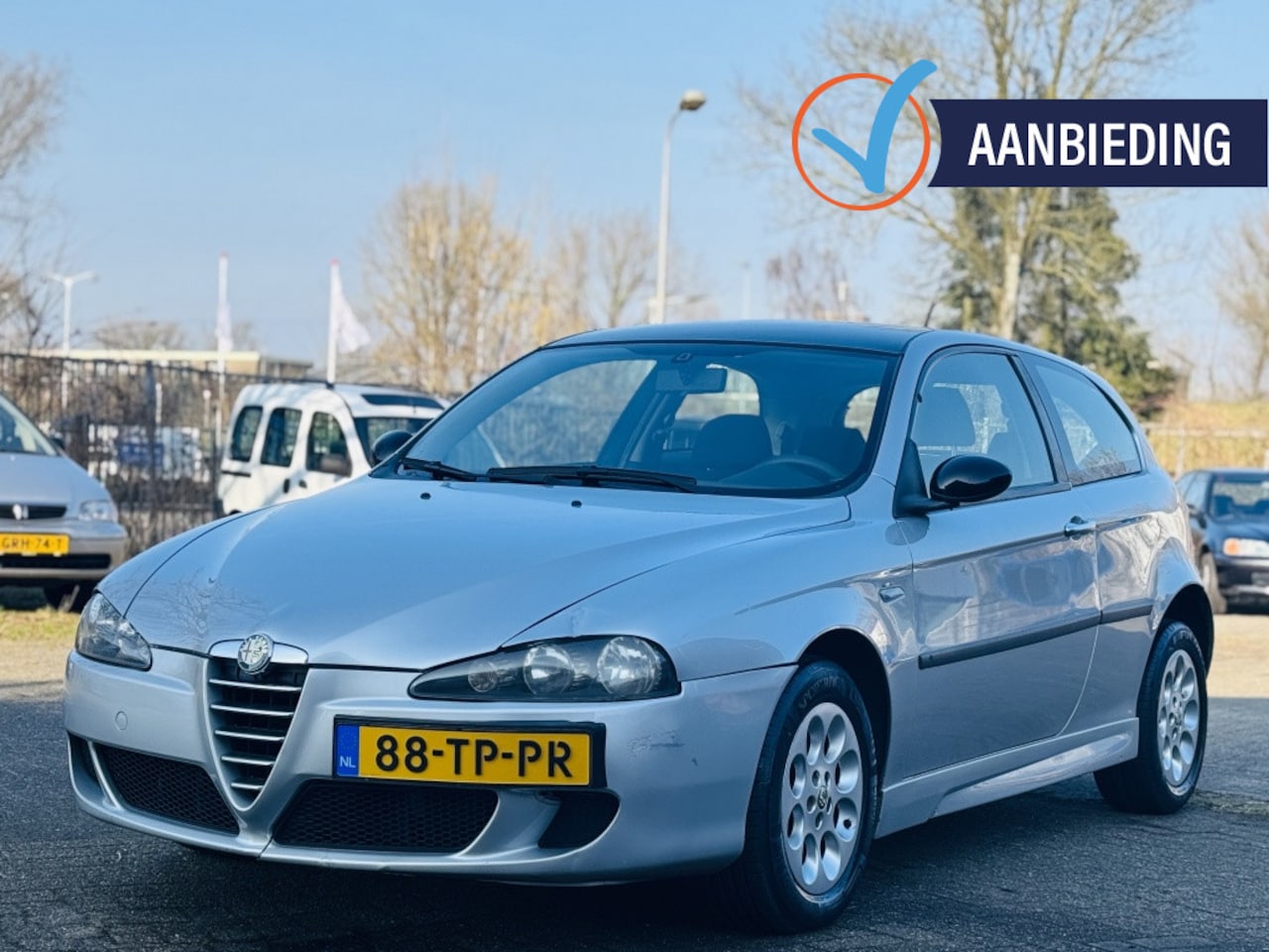 Alfa Romeo 147 - 1.6 TS Sport–Stijl,Sportiviteit en Perfect OH! - AutoWereld.nl