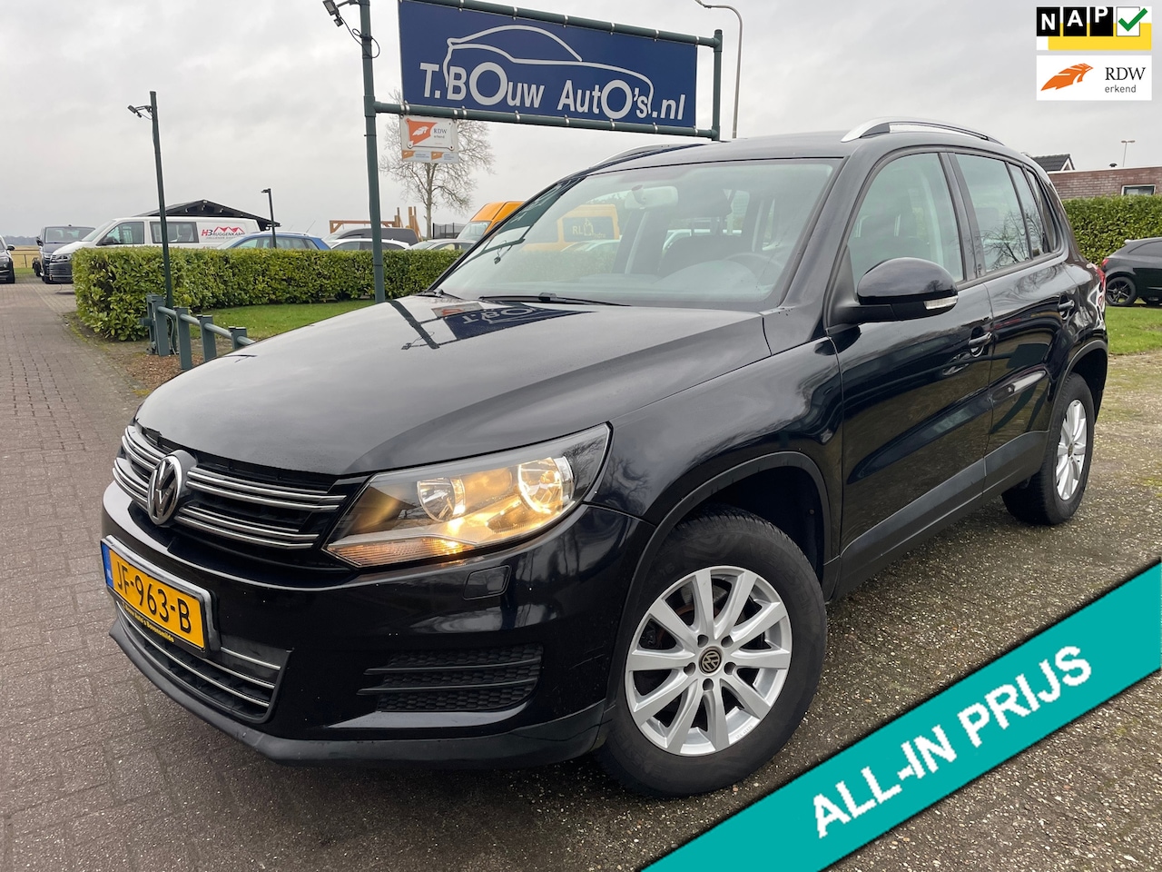 Volkswagen Tiguan - 1.4 TSI 122pk|Trekhaak|Stoelverwarming|All-Season| - AutoWereld.nl