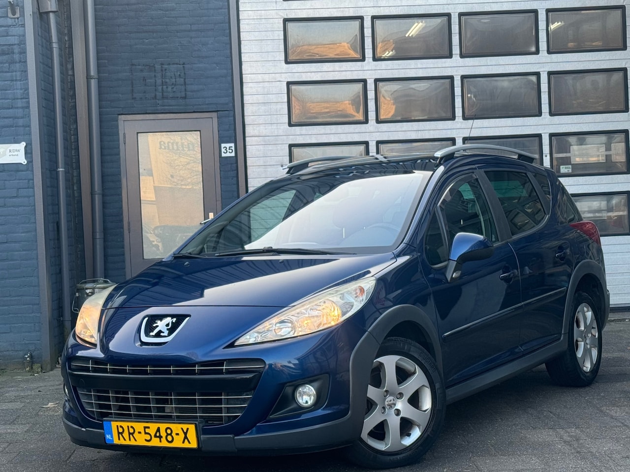 Peugeot 207 SW Outdoor - 1.6 VTi | Clima | Pano | PDC | NW APK - AutoWereld.nl