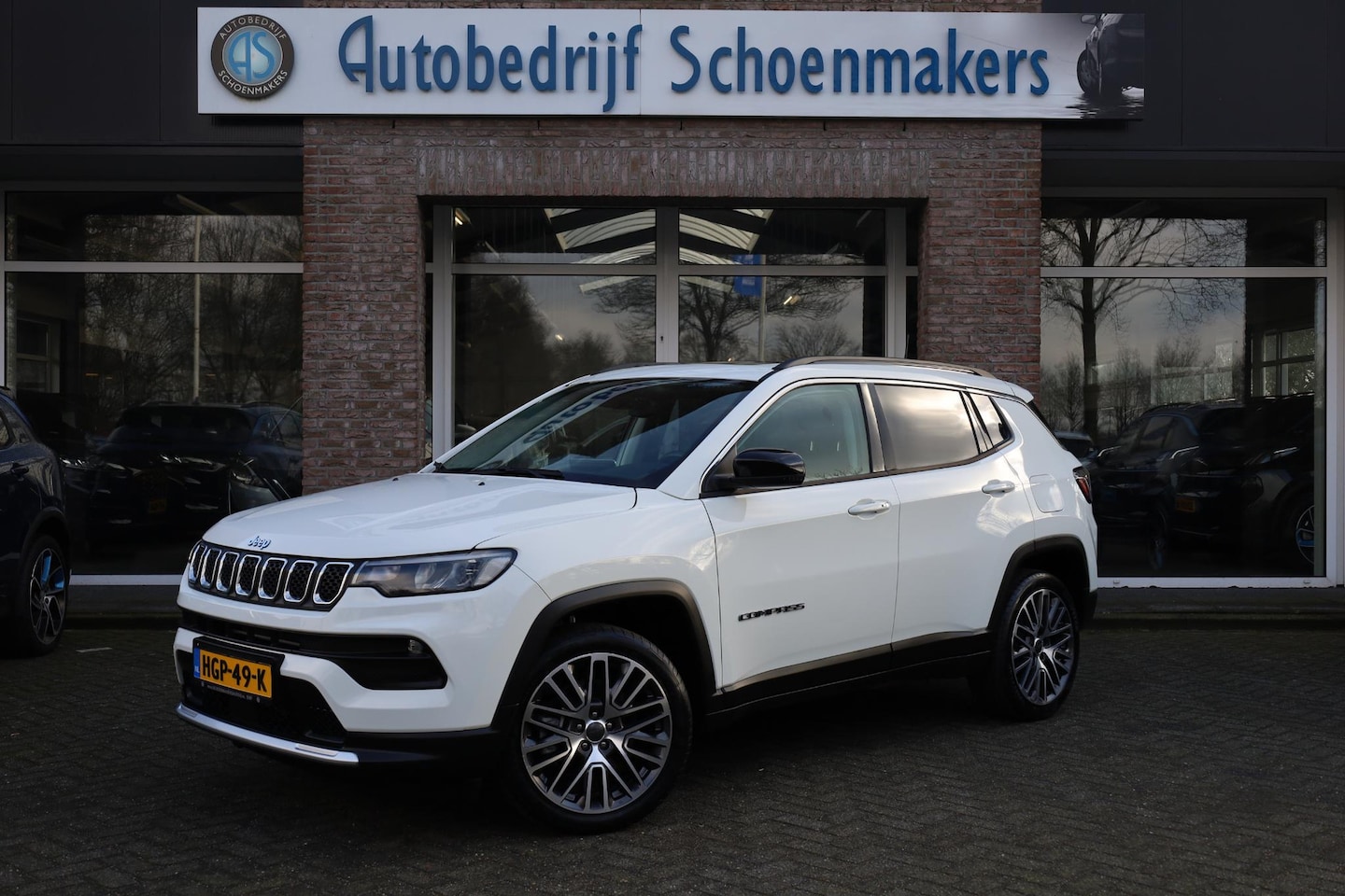 Jeep Compass - 4xe 190 Plug-in Hybrid Electric Limited Lease Ed. 360-CAMERA CARPLAY PANO DAB HALFLEER 19" - AutoWereld.nl