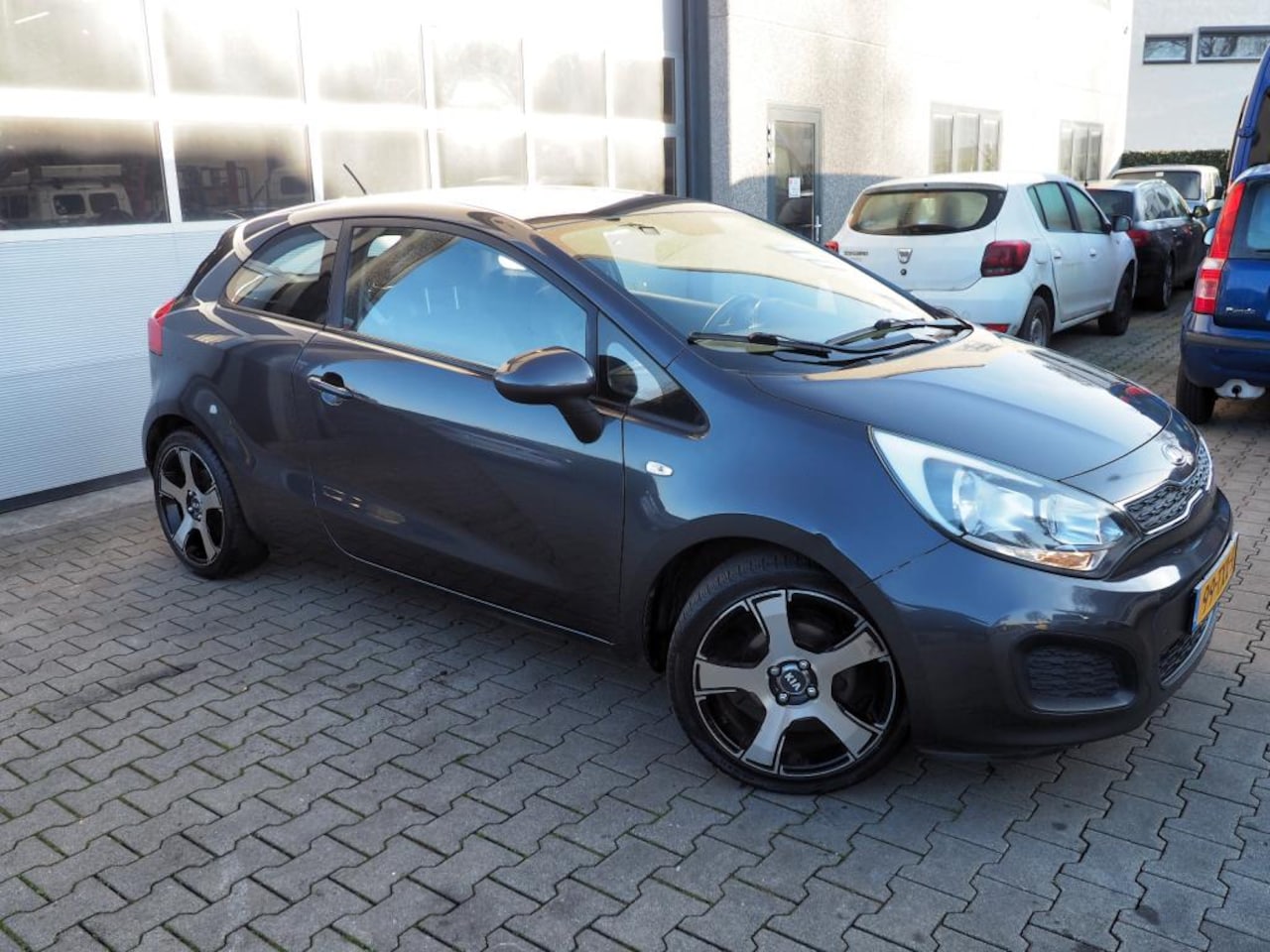 Kia Rio - 1.2 CVVT Comfort Pack AIRCO CRUISE PARKEER S. LM VELGEN - AutoWereld.nl