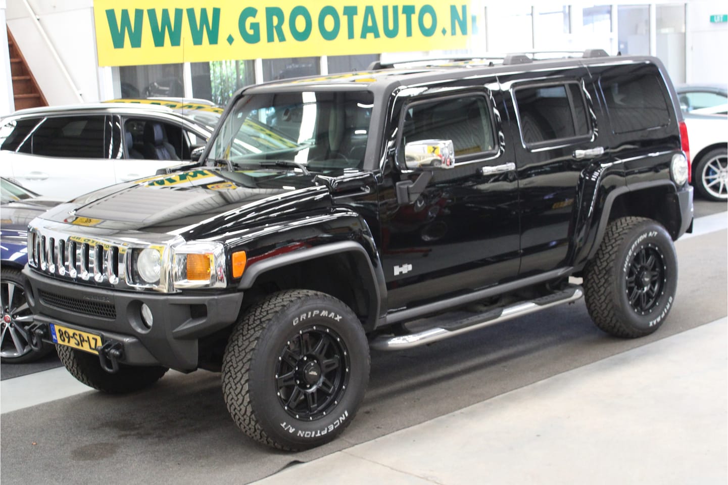 Hummer H3 - 3.5 Executive Automaat 129.730km NAP, Airco, Leder, Trekhaak - AutoWereld.nl