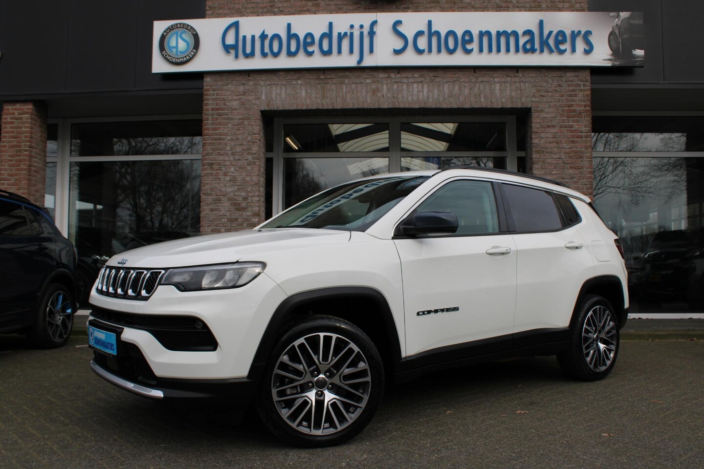 Jeep Compass - 4xe 190 Plug-in Hybrid Electric Limited Lease Ed. 360-CAMERA CARPLAY PANO DAB HALFLEER 19" - AutoWereld.nl