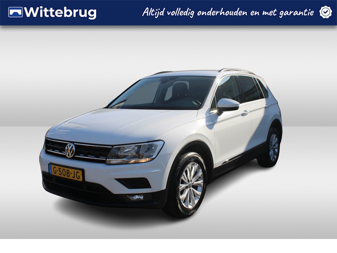 Volkswagen Tiguan - 1.5 TSI 130pk Comfortline Navigatie / LM 17 inch / Parkeersensoren / Climatronic airco - AutoWereld.nl