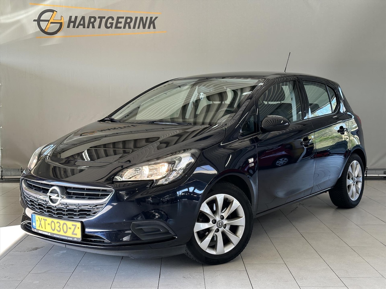 Opel Corsa - 5drs 1.0iT 90pk 120 Jaar Edition *ECC / Navi / Cruise / LMV / - AutoWereld.nl