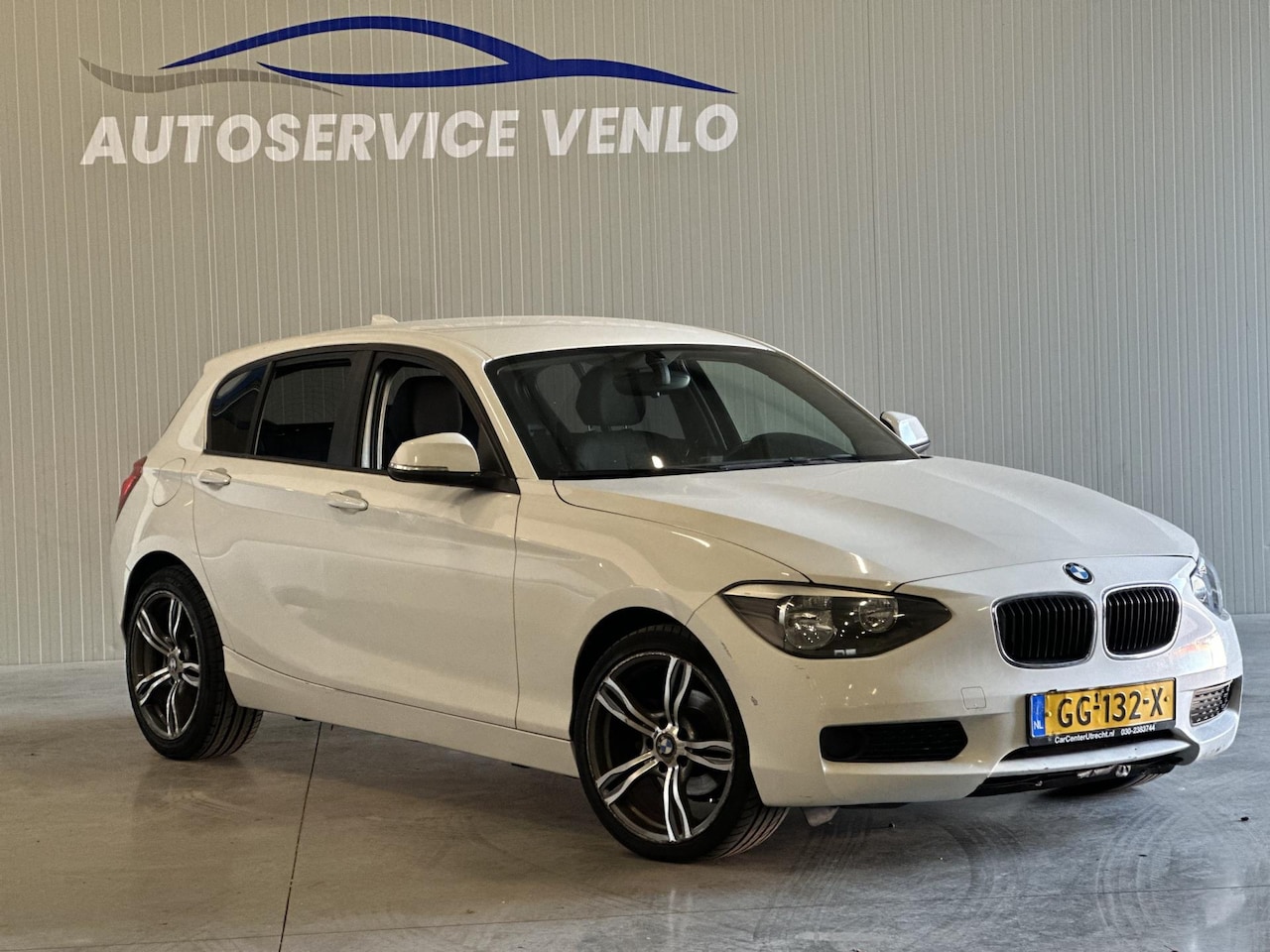 BMW 1-serie - 116i High Executive Wit | lichte schade | - AutoWereld.nl