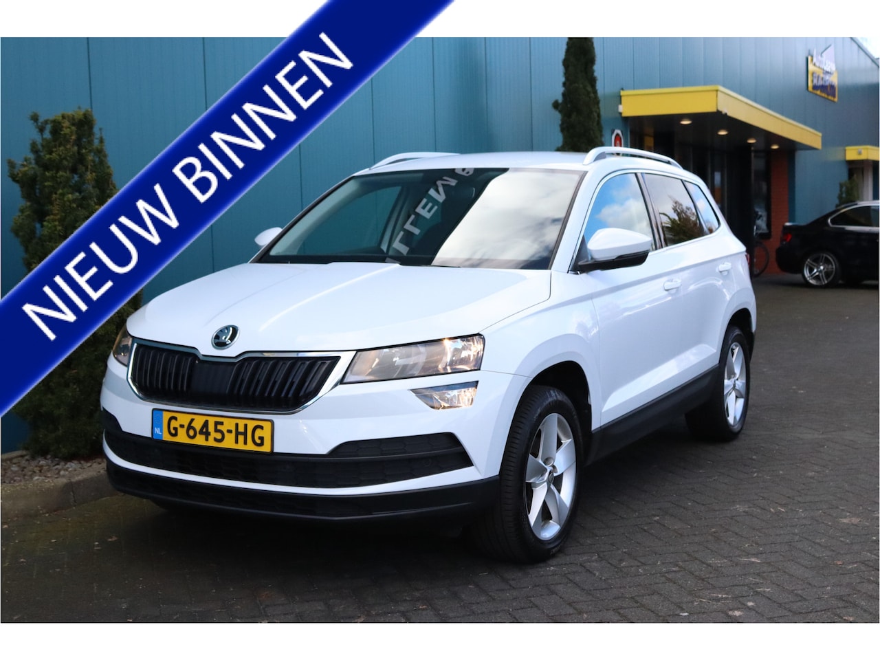 Skoda Karoq - 1.0 TSI DSG AUT. Ambition Business ECC|CARPLAY|STOELV.|CRUISE|NAV|PDC|LMV - AutoWereld.nl