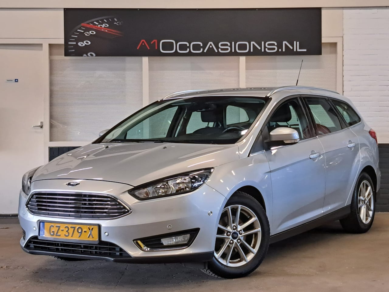 Ford Focus Wagon - 1.0 Titanium Edition + NAVI !! - AutoWereld.nl