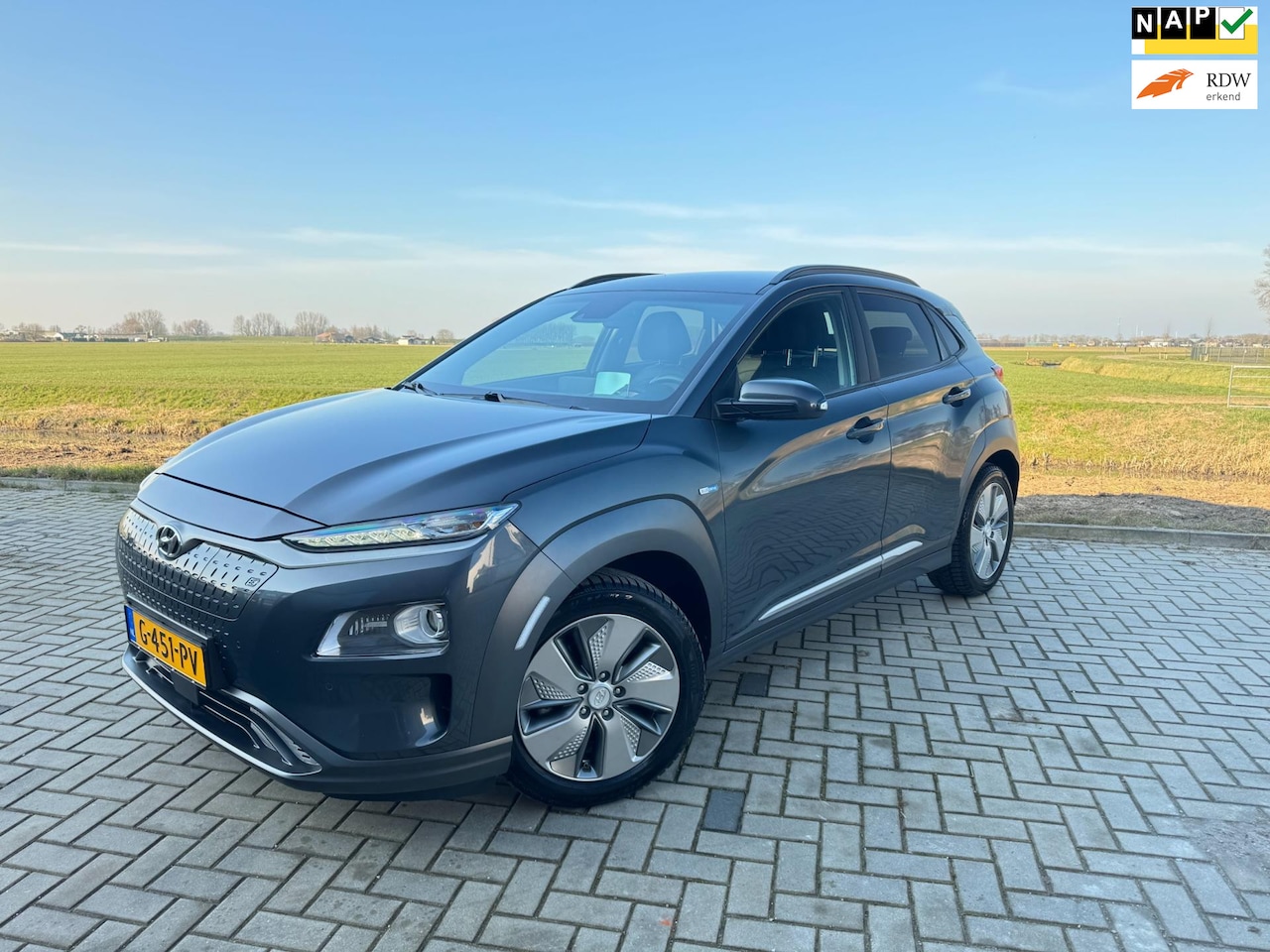 Hyundai Kona Electric - EV Premium 64 kWh 2019 204PK Stoelverwarming / Koeling Leer Carplay Navi - AutoWereld.nl