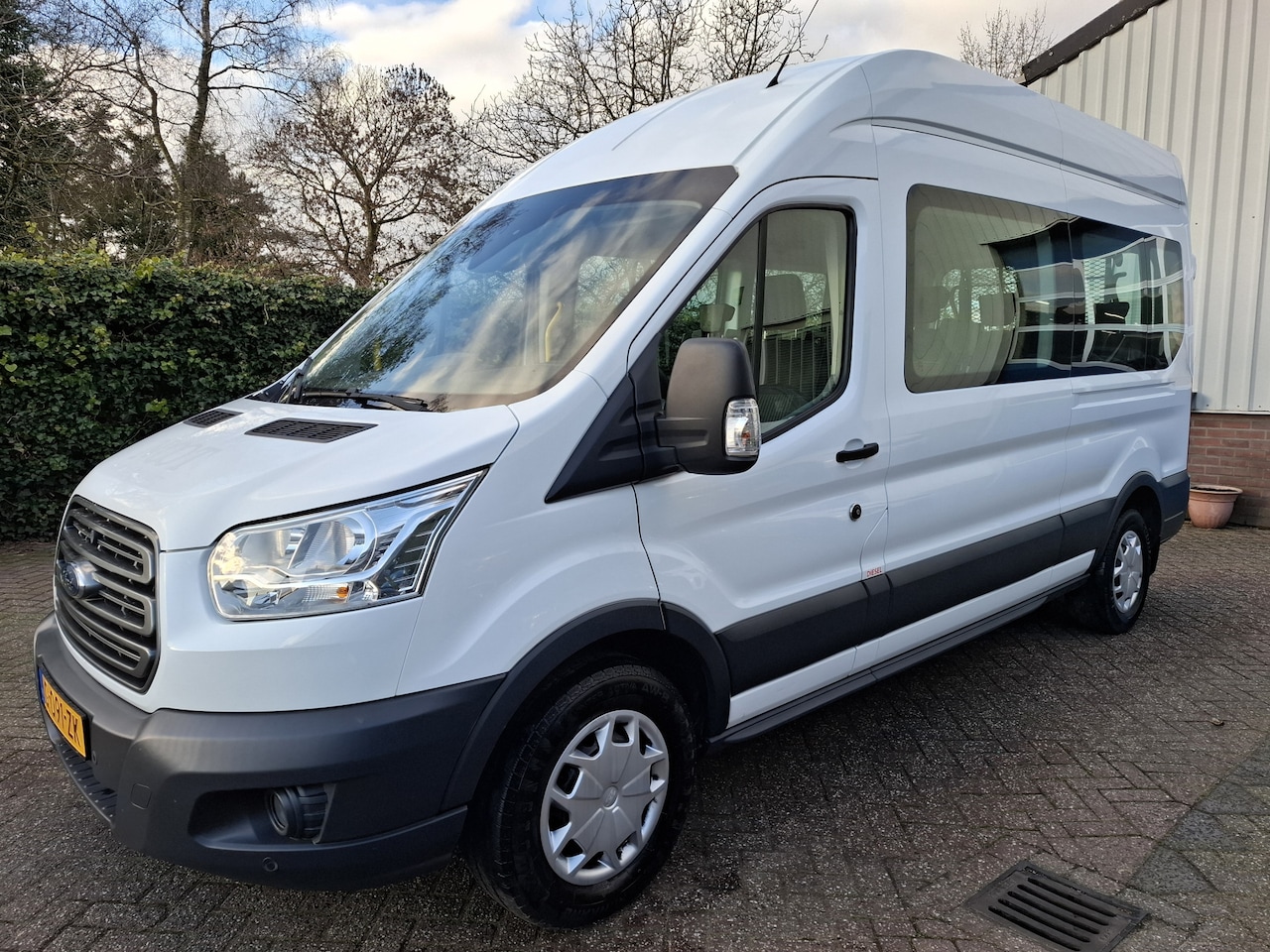 Ford Transit Kombi - 350 2.0 TDCI L3H2 39995.- INCL BTW 9-PERSOONS ROLSTOEL LIFT 130PK - AutoWereld.nl