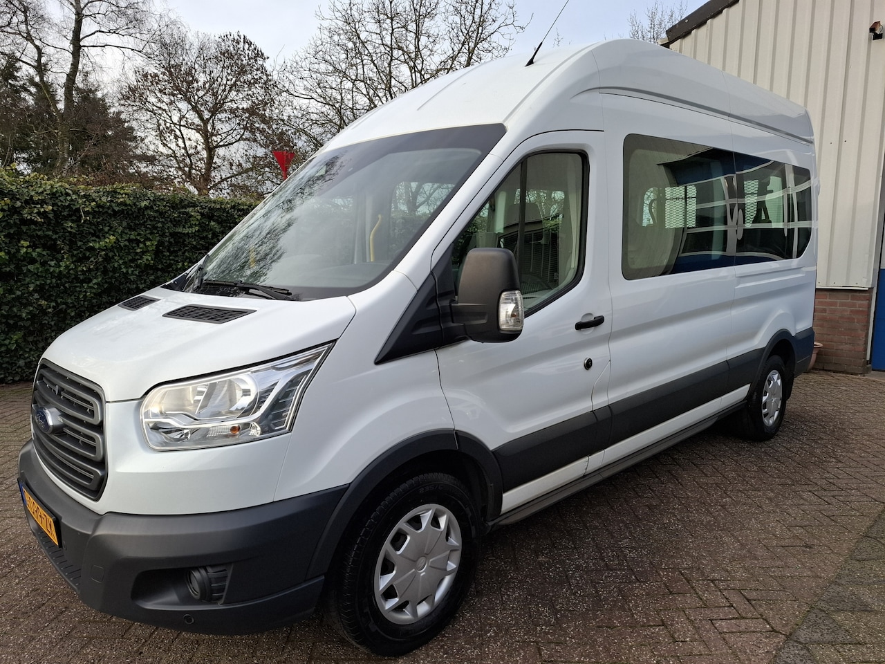 Ford Transit Kombi - 350 2.0 TDCI L3H2 33250.- INCL BTW 9-PERSOONS ROLSTOEL LIFT 130PK - AutoWereld.nl