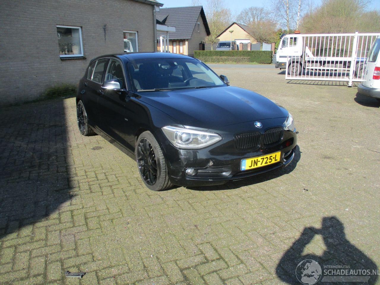 BMW 1-serie - 116i High executive Aut 5drs - AutoWereld.nl