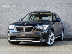 BMW X1 - sDrive18i Executive | Navigatie | Xenon | Panorama | Leder | Saphire Zwart