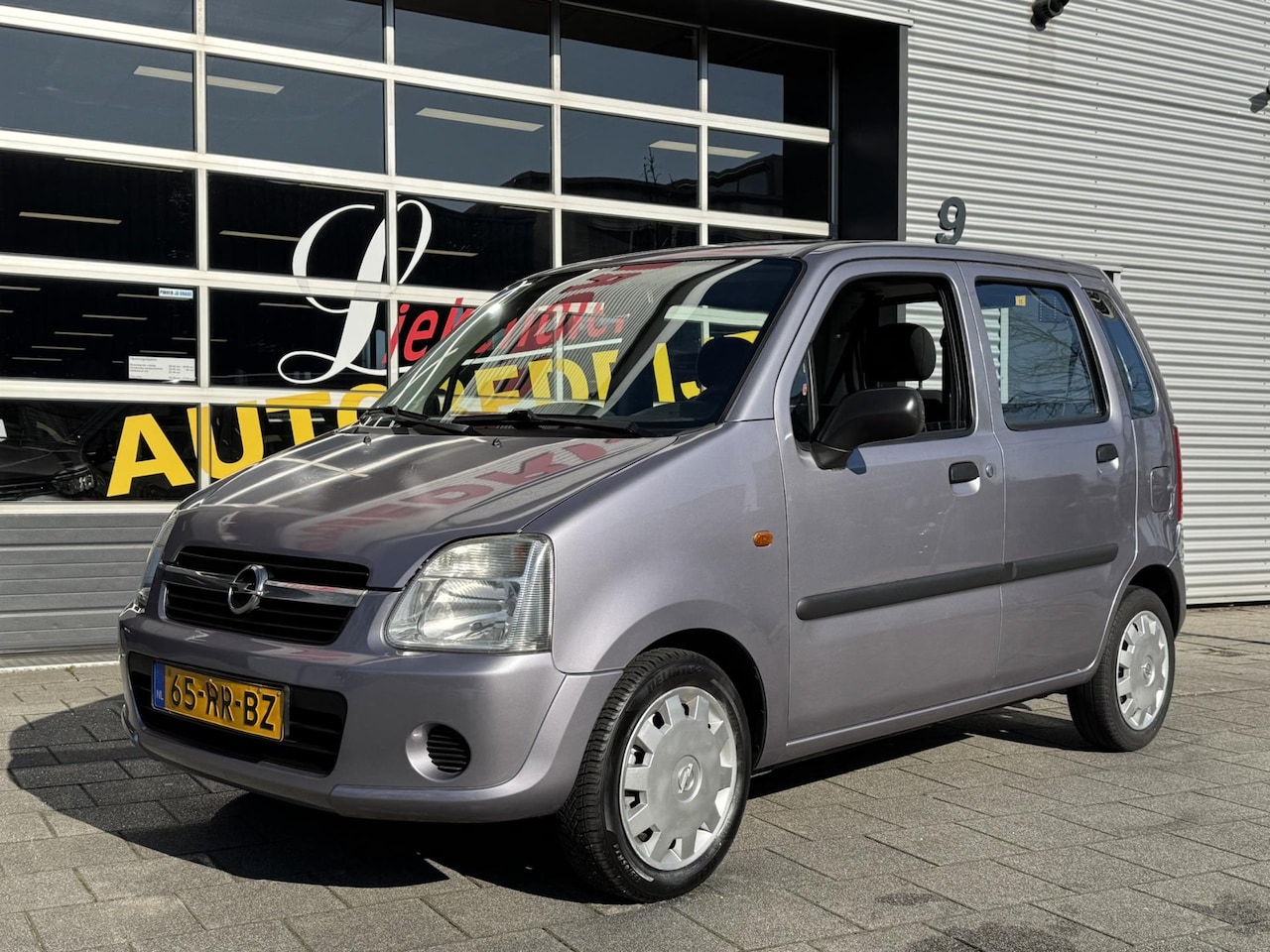 Opel Agila - 1.0-12V Flexx - 69.000 KM I Dealeronderhouden - AutoWereld.nl