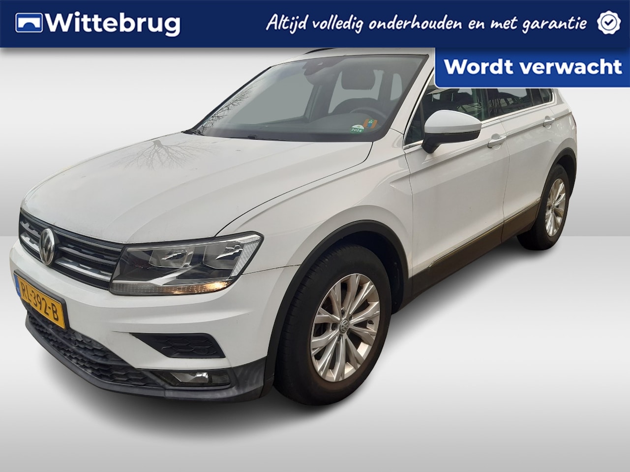 Volkswagen Tiguan - 1.4 TSI Comfortline Unieke kilometer stand/ Pano / Navigatie / Parkeer sensoren V+A / Lich - AutoWereld.nl