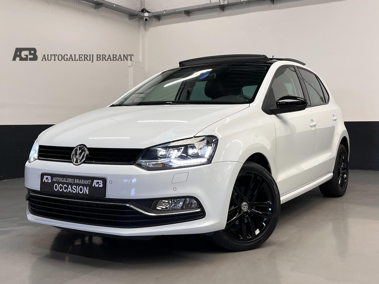 Volkswagen Polo - 1.2 TSI Highline Automaat/Panoramadak/Carplay - AutoWereld.nl