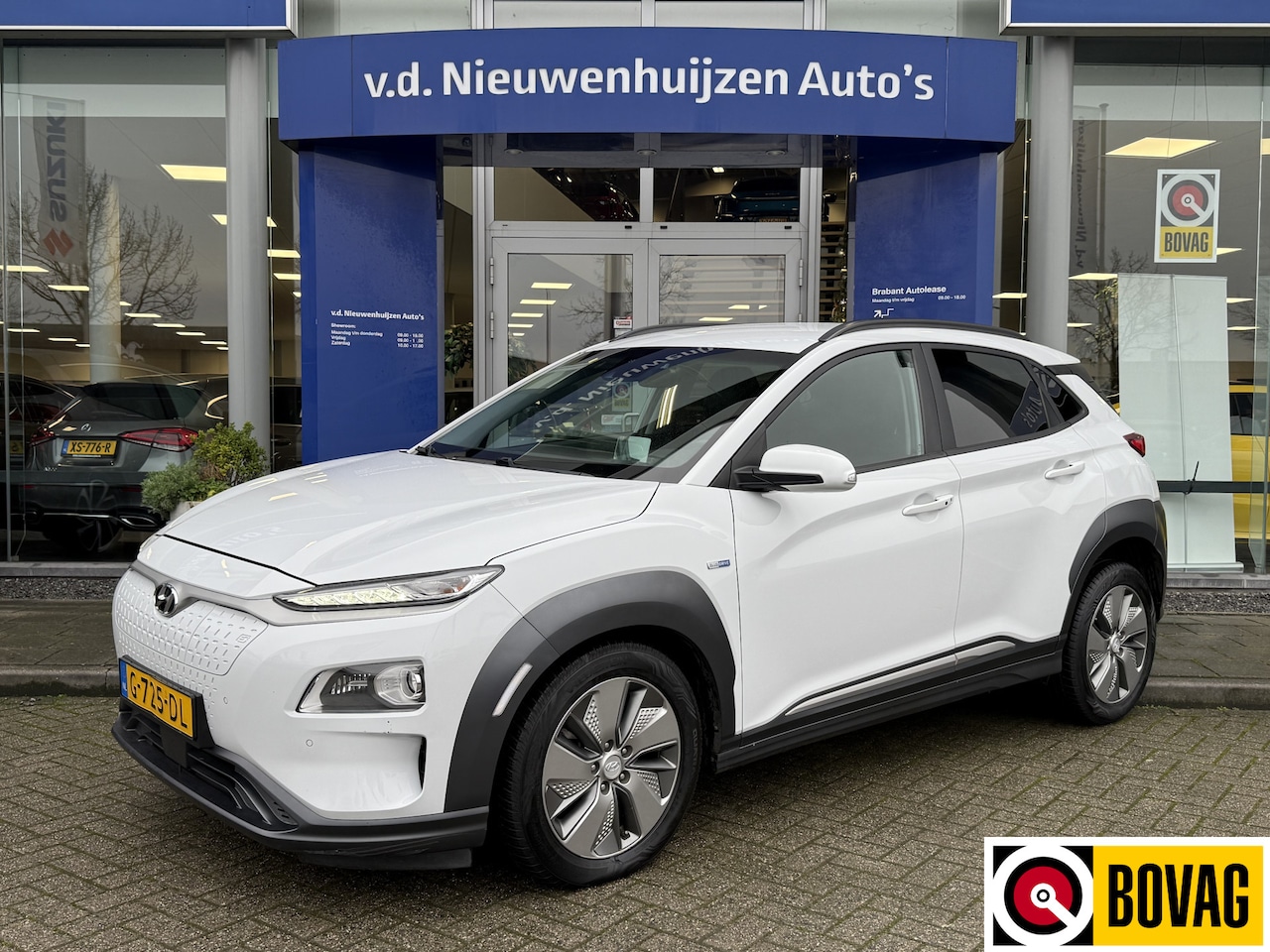 Hyundai Kona Electric - EV Premium 64 kWh | Leder | HUD | Navi | Info Bas 0492588982 - AutoWereld.nl