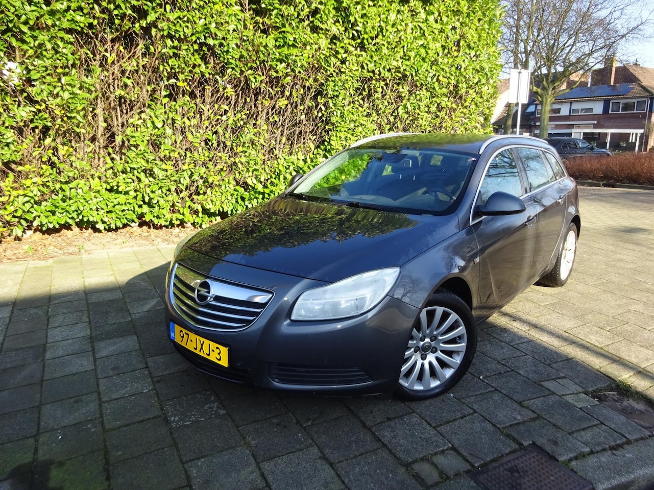 Opel Insignia Sports Tourer - MET NAVI, AIRCO & JAAR APK! - AutoWereld.nl