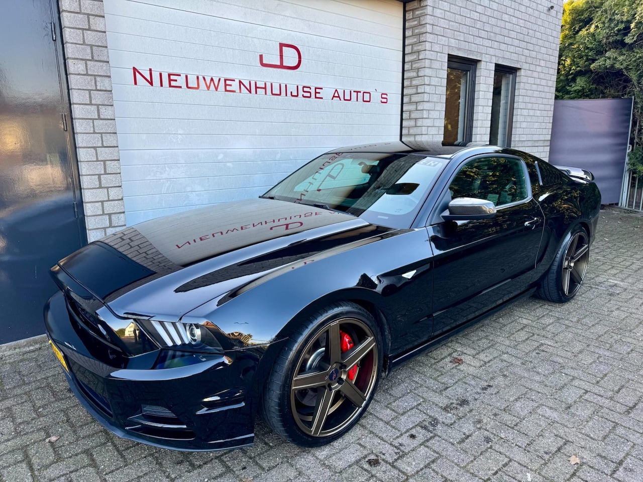 Ford Mustang - USA 3.7 V6, handbak, 20 inch, leder, navi, Borla, Brembo's enz… - AutoWereld.nl