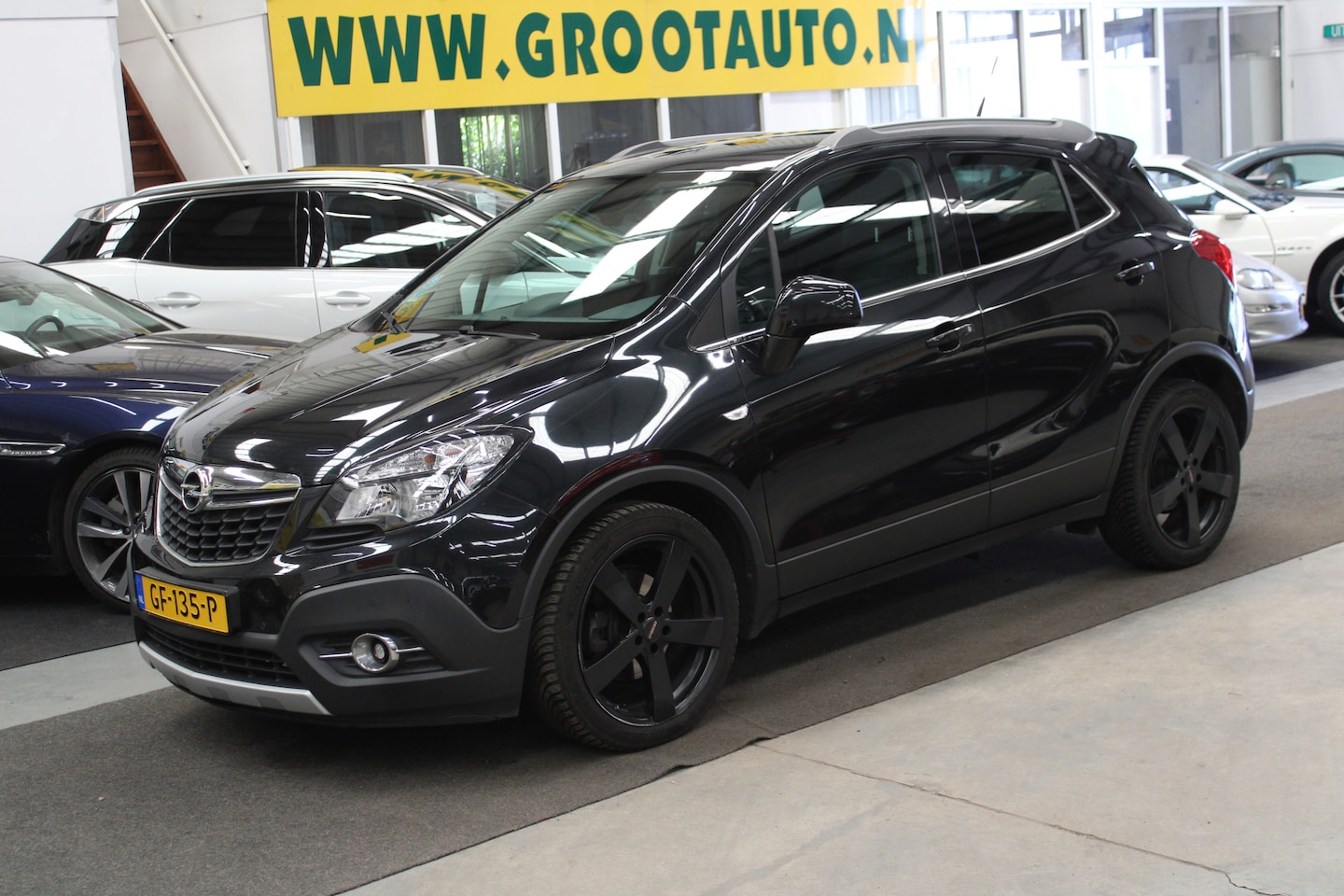 Opel Mokka - 1.4 T Cosmo NAP, Airco, Navi, Parkeersensoren, Leer/Stof - AutoWereld.nl